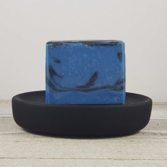 blue handmade soap with a black swirl